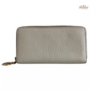 Authentic GUCCI Cream Guccissima Leather Interlocking G Heart Zip Around Wallet
